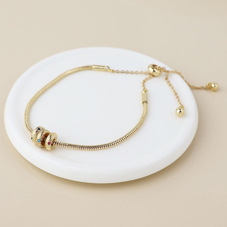 Bracelet: Adjustable Snake Chain Golden Rings Colour Crystals - Gold - POM