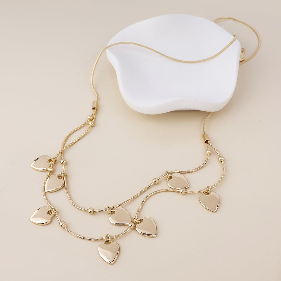 Necklace: Snake Chains Layered With Heart Charms Moonbeam - Gold - POM