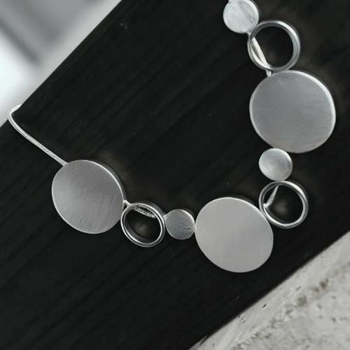 Necklace: Short Chunky Multi Size Open Close Circles Scratched TARA - Silver Plated - Dansk