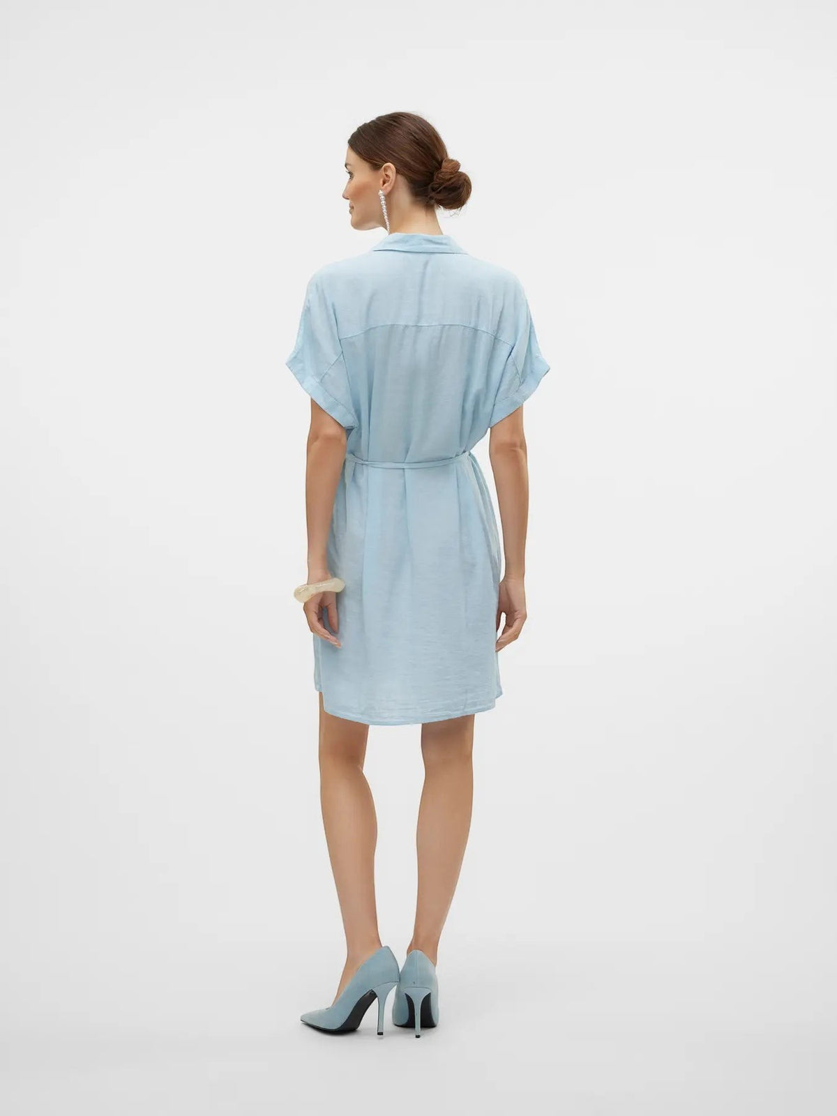 Antique Rose Boutique sky blue short sleeve button down shirt dress with tie waist, back view on model