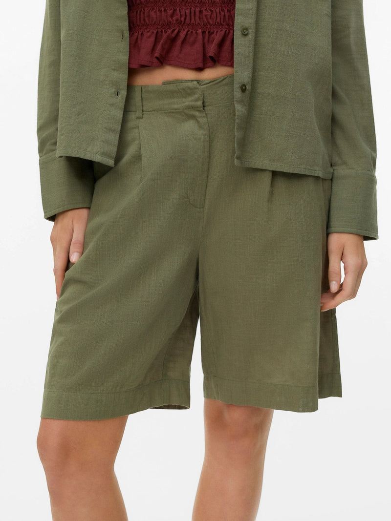 Antique Rose Boutique deep lichen green cotton and linen Bermuda shorts with side pockets and belt loops.