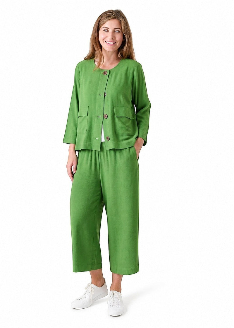 Antique Rose Boutique green linen viscose culottes and matching button-up jacket worn by a smiling woman