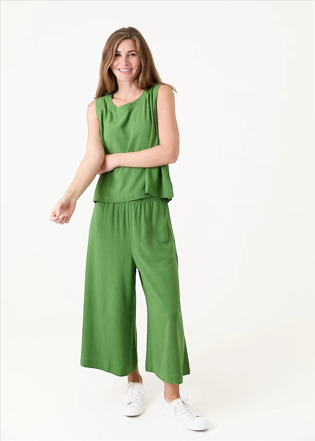 Antique Rose Boutique green linen viscose wide-leg culottes and matching sleeveless top worn by a smiling woman.