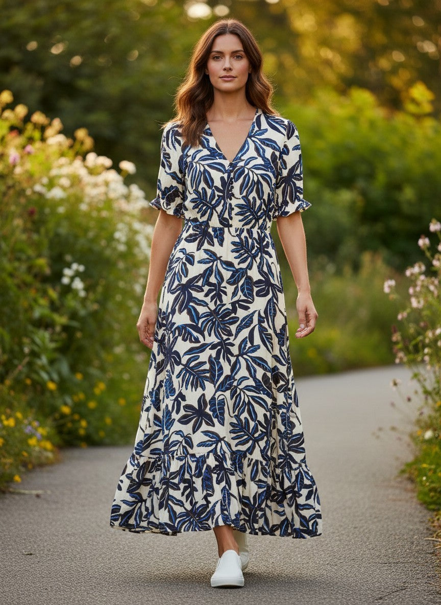 Antique Rose Boutique cream and navy leaf print maxi dress with V-neck and short sleeves in a soft viscose fabric.