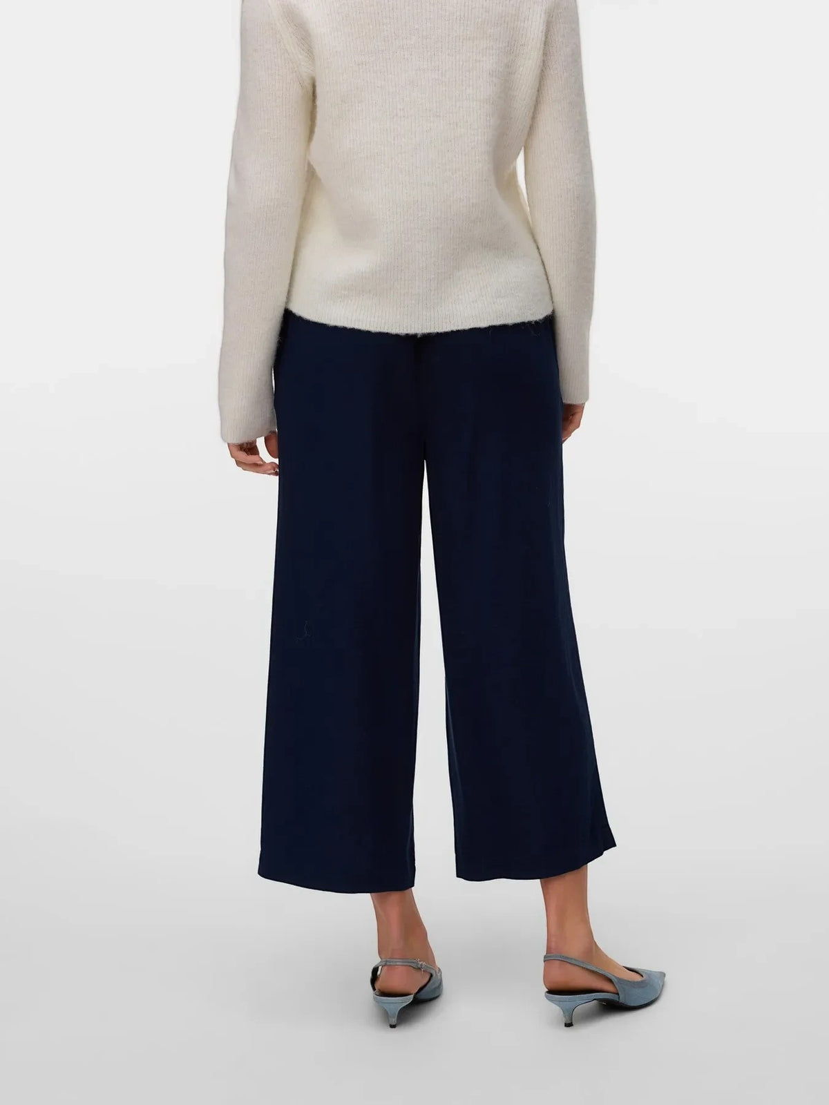 Antique Rose Boutique navy wide-leg culotte trousers with a high elasticated waist, shown from the back.