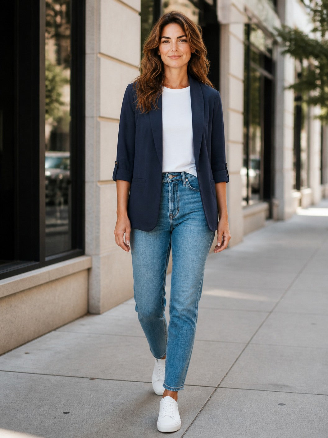 Antique Rose Boutique navy 3/4 sleeve blazer in LENZING ECOVERO viscose linen blend worn by a woman on a city street