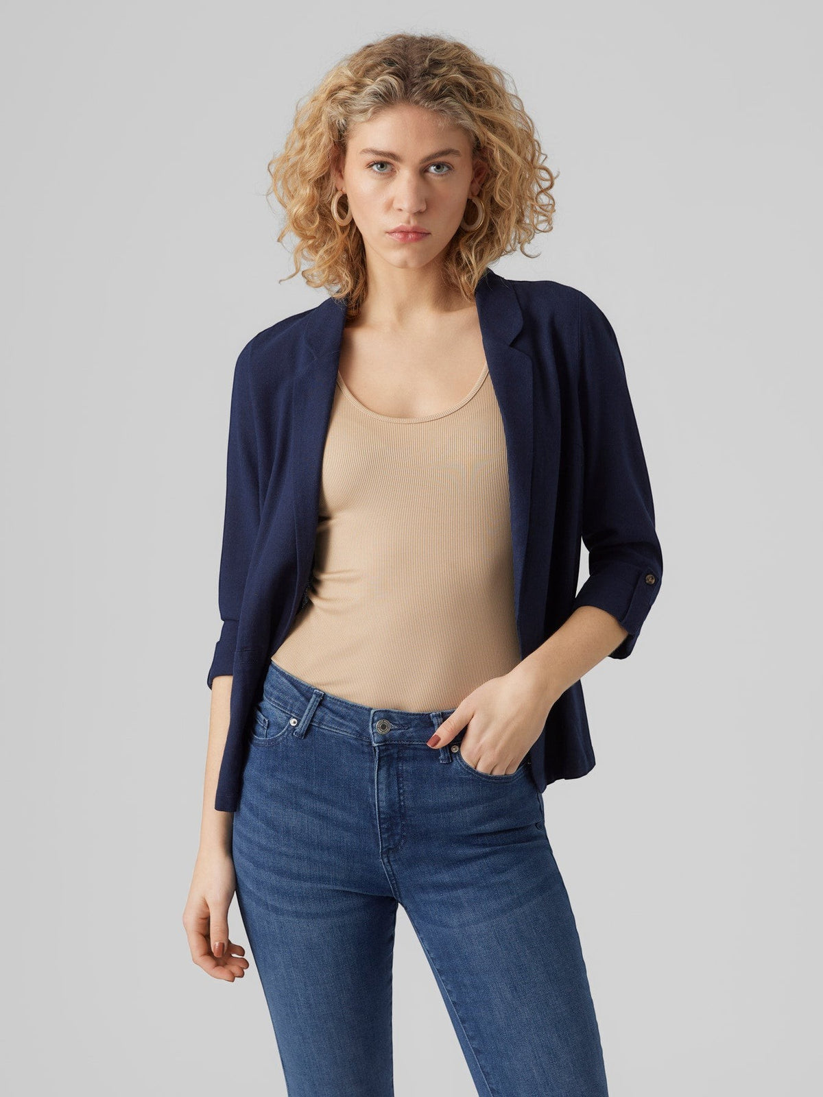 Antique Rose Boutique navy blue LENZING ECOVERO linen blend blazer with 3/4 sleeves worn by a blonde model
