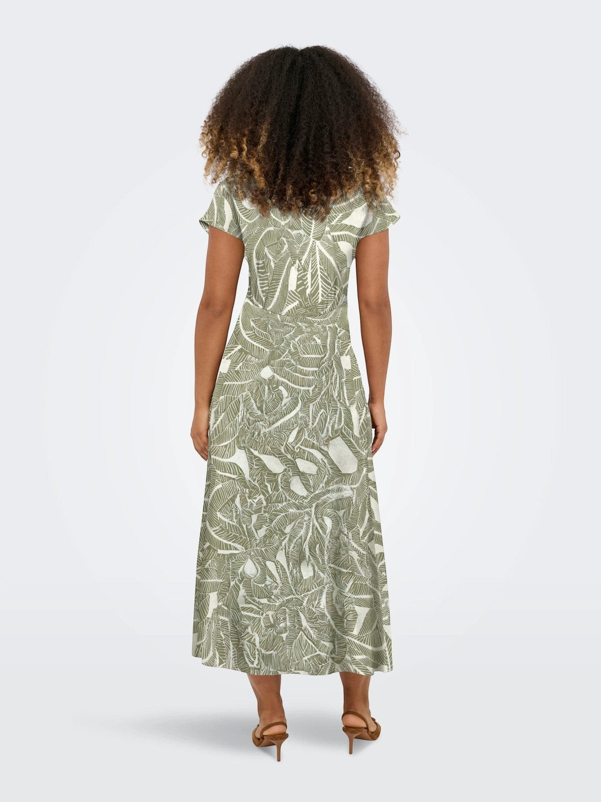 Antique Rose Boutique midi dress in olive green and white botanical leaf print with flutter sleeves, back view.