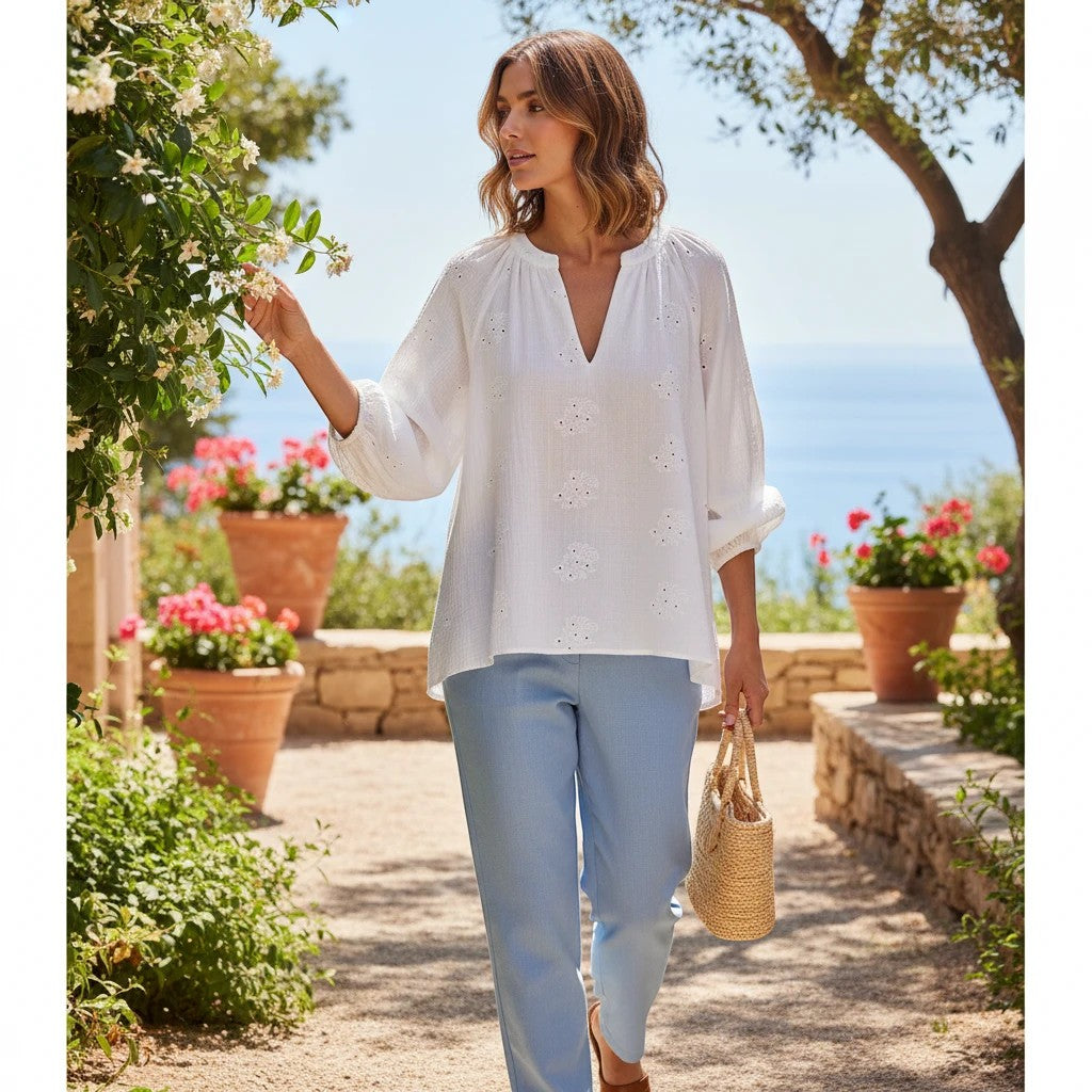 Antique Rose Boutique Vero Moda white cotton long sleeve V-neck blouse with anglaise embroidery in a garden setting