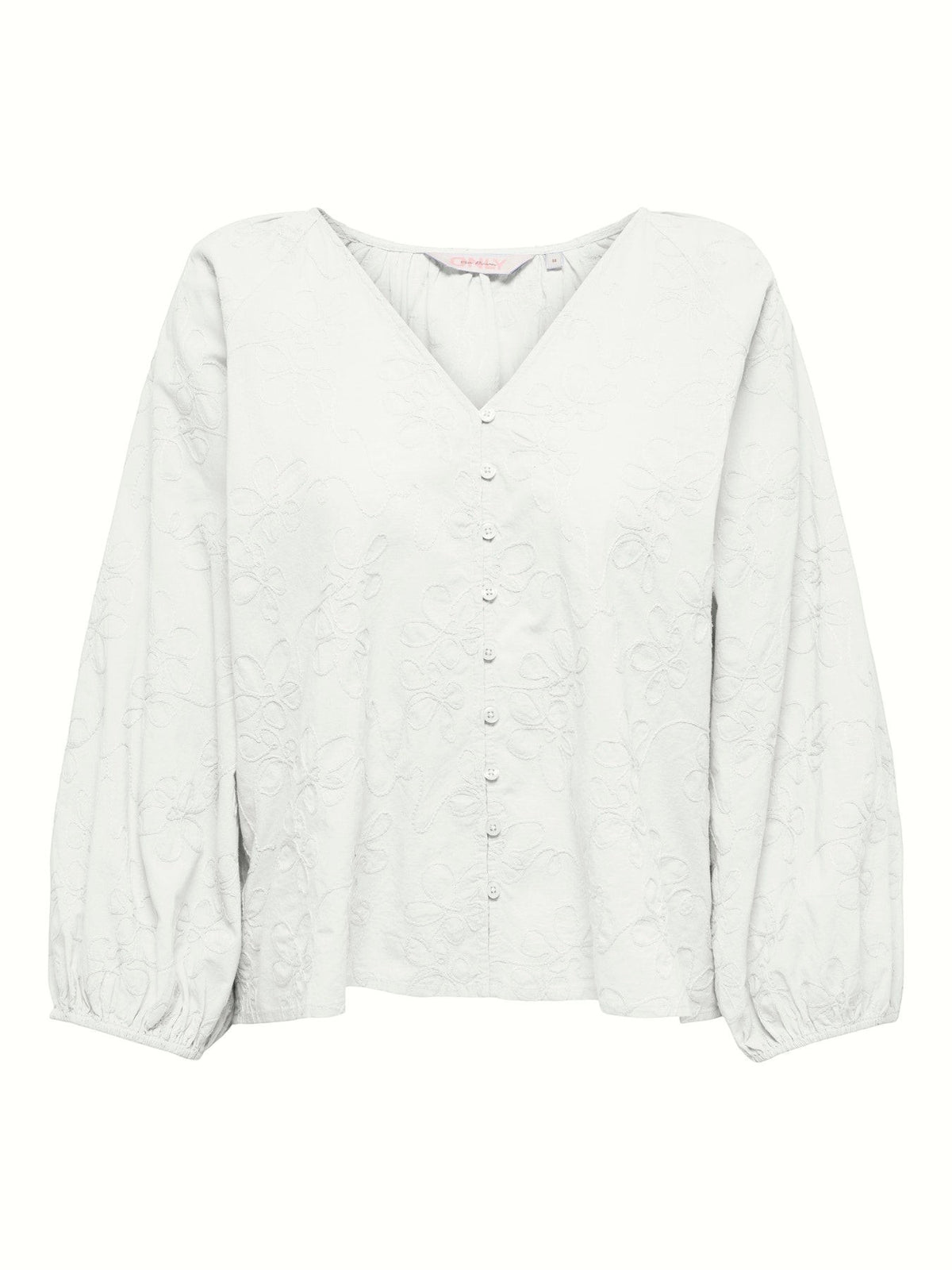Antique Rose Boutique white cotton blouse with V-neck, button-down front, and tonal floral embroidery on 3/4 sleeves.