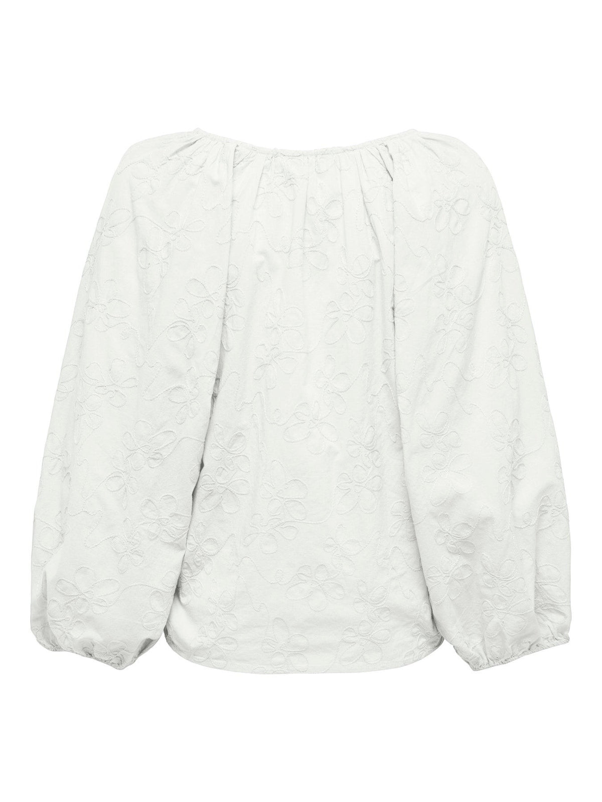 Antique Rose Boutique white cotton blouse with tonal floral embroidery, voluminous 3/4 sleeves, and a relaxed fit.