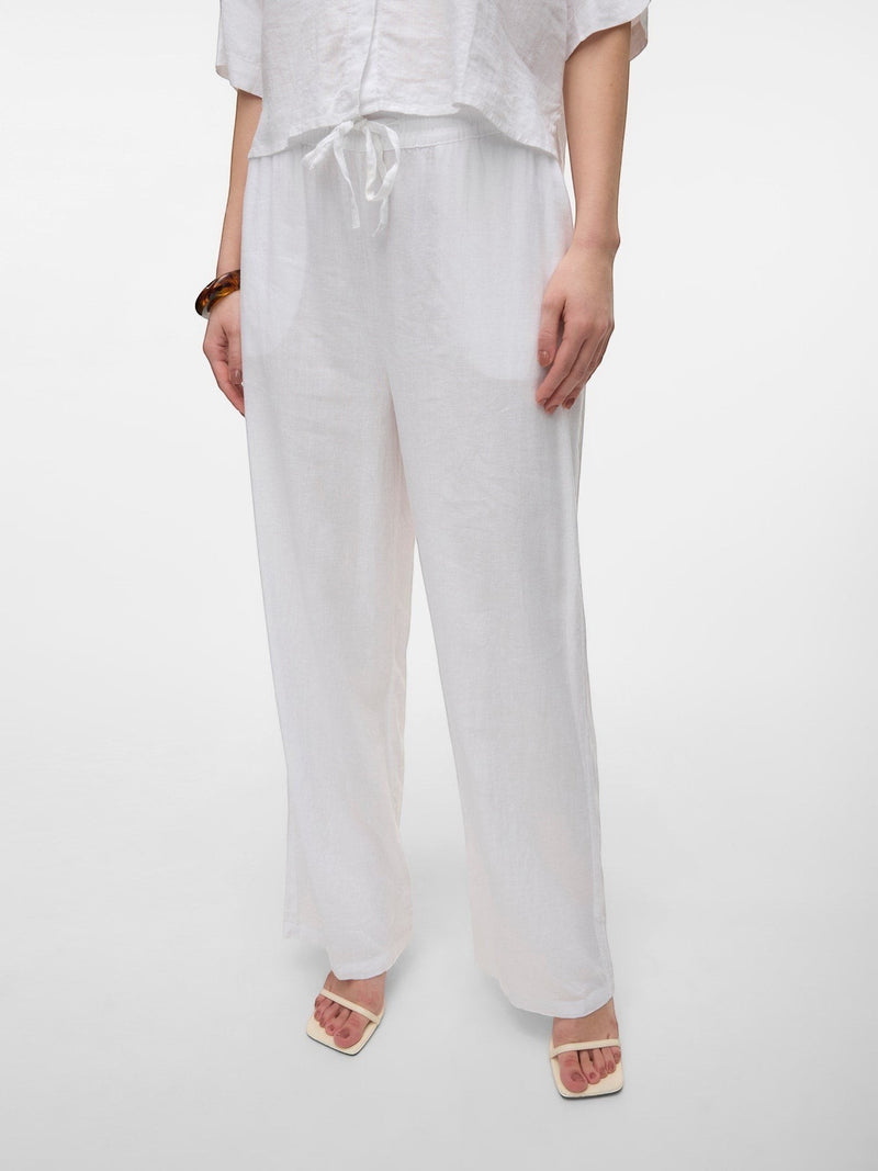 Antique Rose Boutique Vero Moda white linen wide-leg trousers with a drawstring waist worn by a model.