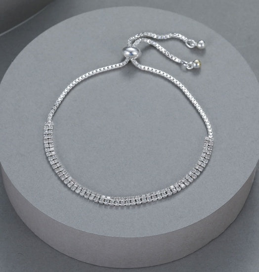 Bracelet: Faux Diamond Pulling Tennis Chain - Silver - Gracee