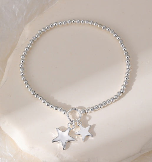 Bracelet: Stretch Beads Large and Small Star Charms - Silver