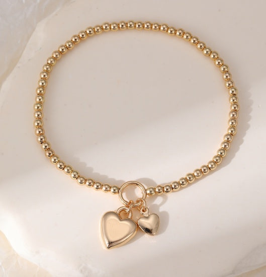 Bracelet: Stretch Beads Large and Small Heart Charms - Gold