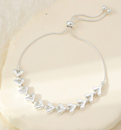 Bracelet: Pulling Heart Bead Chain - Silver - Gracee