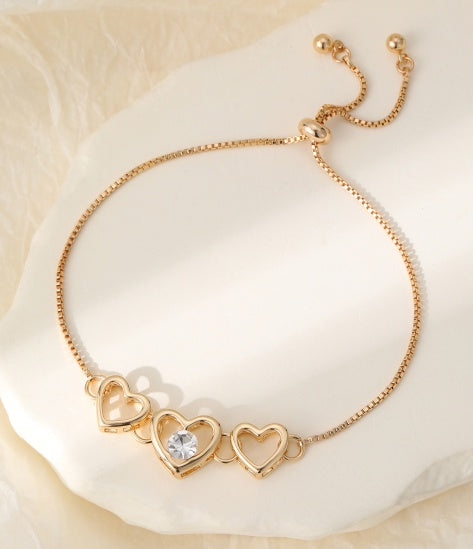 Bracelet: Lariat Triple Hearts With Crystal - Gold